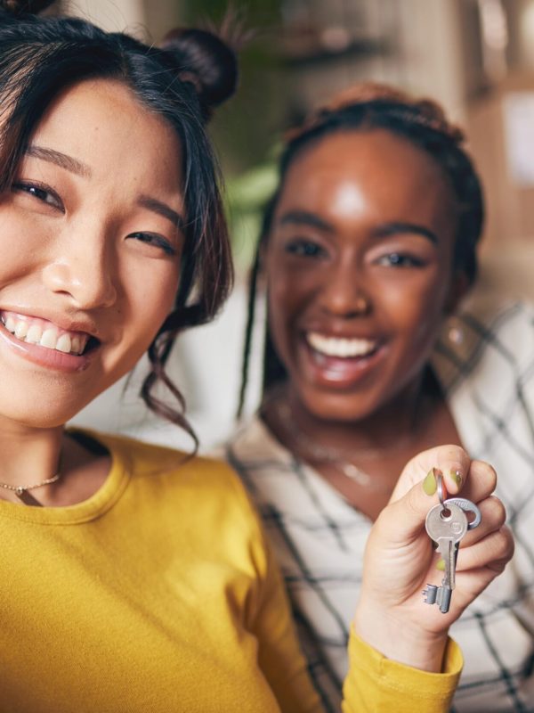 couple_of_friends_keys_and_new_home_selfie_for_mo_2023_11_27_05-min