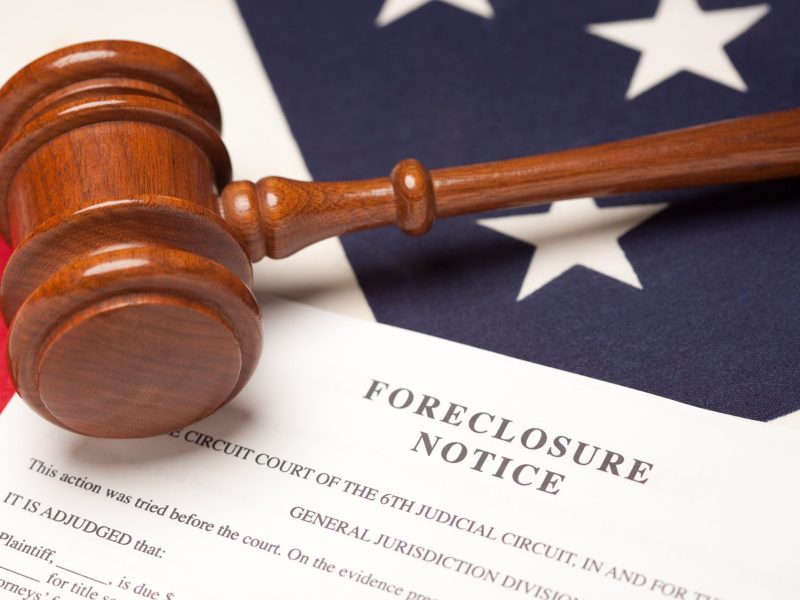 gavel_american_flag_and_foreclosure_notice_2023_11_27_05_28_21_utc-min
