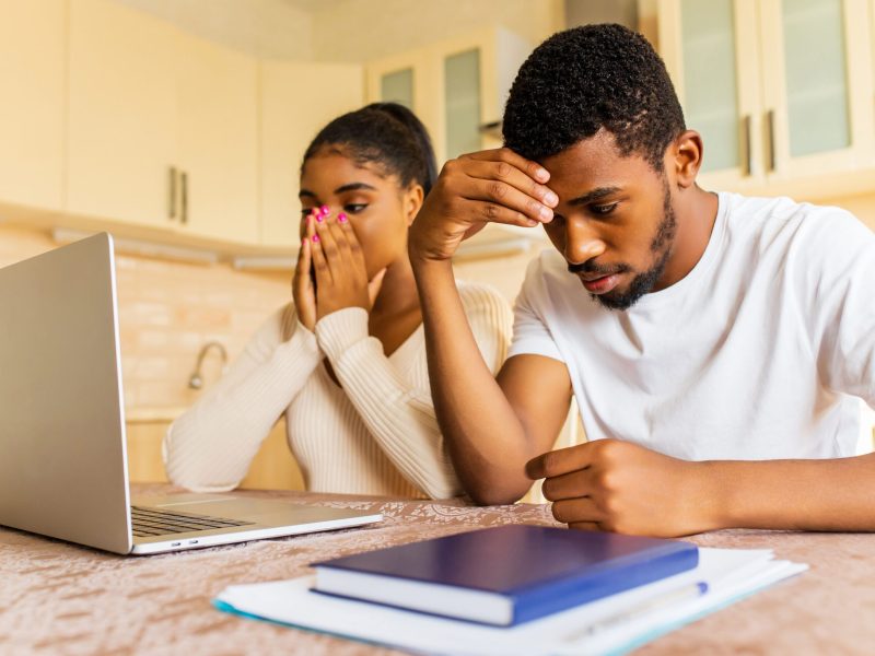 stressed_african_american_couple_looking_frustrate_2023_11_27_05-min
